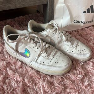 White Nike Court Runners with iridescent swish.